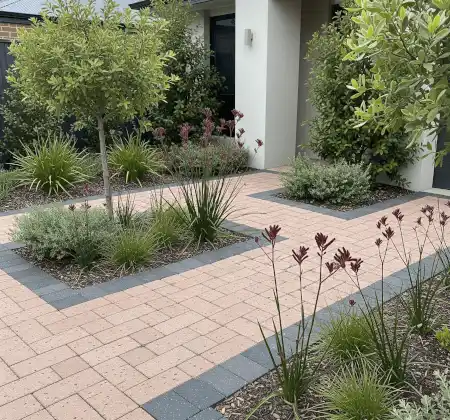 Small front yard with contrasting paving